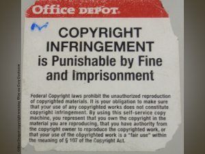 Notice from an Office Depot copier: COPYRIGHT INFRINGEMENT is Punishable by Fine and Imprisonment (and much more very small print)