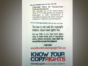 Public sign that says: the law requires that we tell you this (outlines copyright rights of owners); the law does not require that we tell you this (outlines rights of users) Learn More - Know Your Copyrights